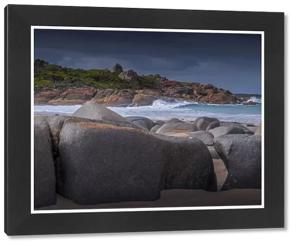 Rocky outcrops and a beautiful stretch of sand called Broken Arm beach, near Grassy, King Island, Bass Straight, Tasmania