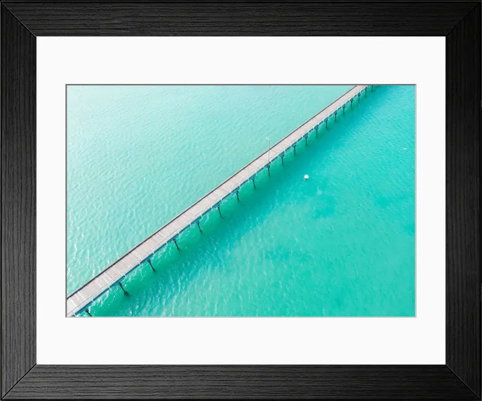 Framed Print : Long jetty out into the clear aqua ocean water Framed Print : Long jetty out into the clear aqua ocean water