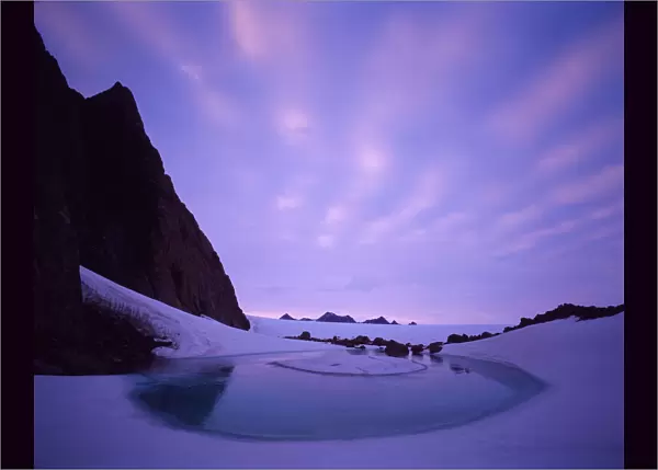 Antarctica, Frames Mountains, Melt Lake below Masson Range, dusk