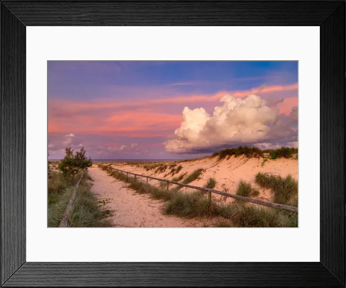 Framed Print : Vibrant storm clouds at sunset over a sandy beach Framed Print : Vibrant storm clouds at sunset over a sandy beach