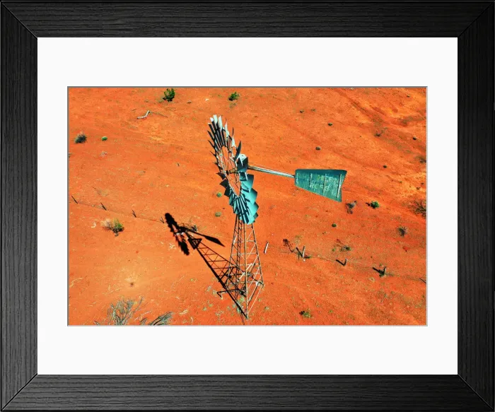 Framed Print : Windmill, water windpump on farm with dry red dirt field, Australia, aerial view Framed Print : Windmill, water windpump on farm with dry red dirt field, Australia, aerial view