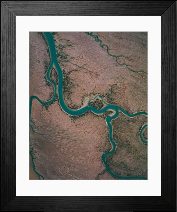 Framed Print : Winding river channel at low tide as seen from drones point of view, Lincolnshire Framed Print : Winding river channel at low tide as seen from drones point of view, Lincolnshire