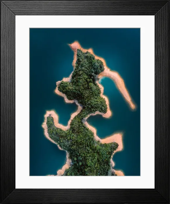 Framed Print : Aerial shot of unique shaped island with a forest, Hong Kong Framed Print : Aerial shot of unique shaped island with a forest, Hong Kong