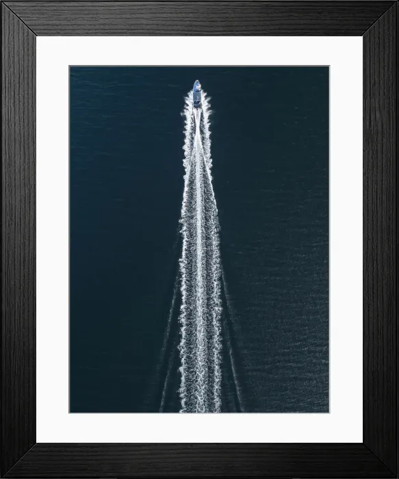 Framed Print : Aerial image of a speed boat moving quickly across the ocean, Hong Kong Framed Print : Aerial image of a speed boat moving quickly across the ocean, Hong Kong