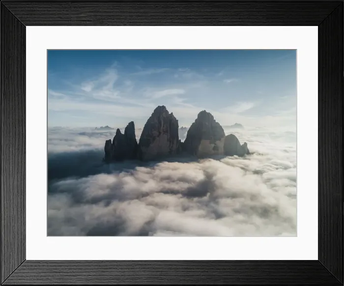 Framed Print : Majestic aerial shot above the clouds looking towards Tre Cime Di Lavaredo, Italy
