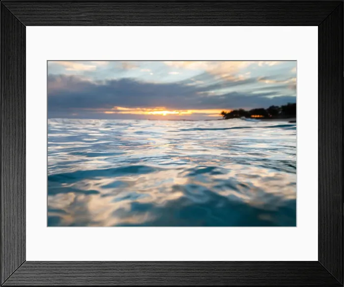 Framed Print : Sunrise in the water seeing the first light hit the ripples on the ocean surface Framed Print : Sunrise in the water seeing the first light hit the ripples on the ocean surface