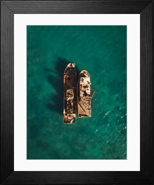 Framed Print : Overhead shot of two shipwrecks in Port Moresby Framed Print : Overhead shot of two shipwrecks in Port Moresby