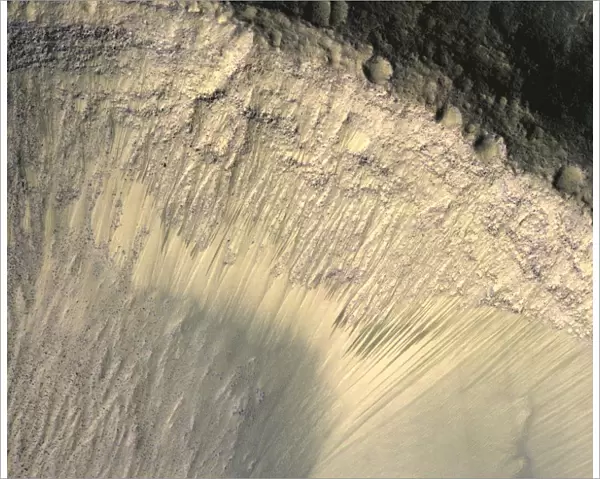 Seasonal Changes in Dark Marks on an Equatorial Martian Slope