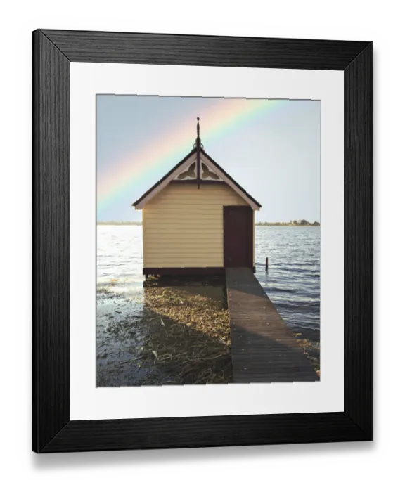 Framed Print : Boat shed with rainbow in sky