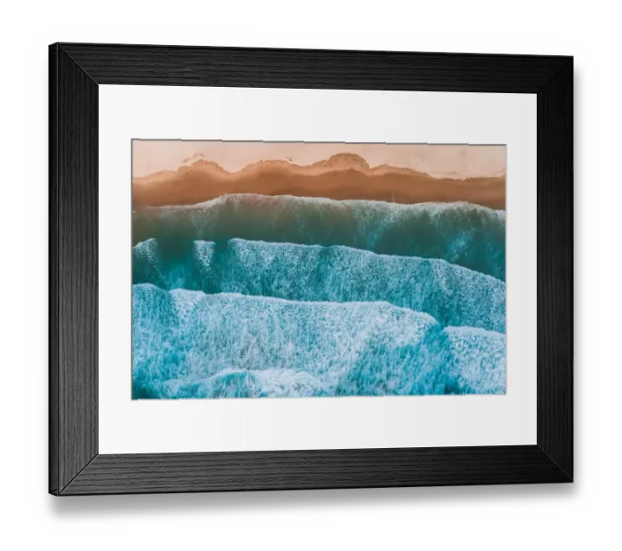 Framed Print : Aerial view of sea waves breaking on shore