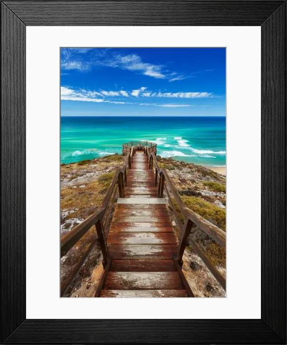 Framed Print : The view. Wooden steps lead to a beautiful view over the ocean