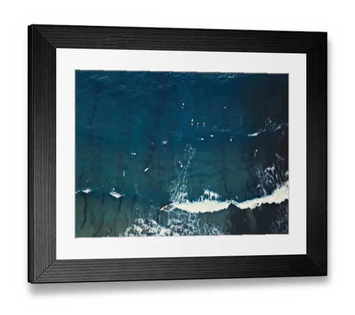 Framed Print : Aerial view of a group of surfers. Abstract Background