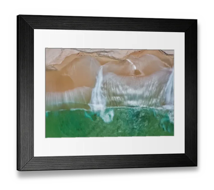 Framed Print : Aerial view of turquoise water crashing onto a sandy beach - Long Exposure