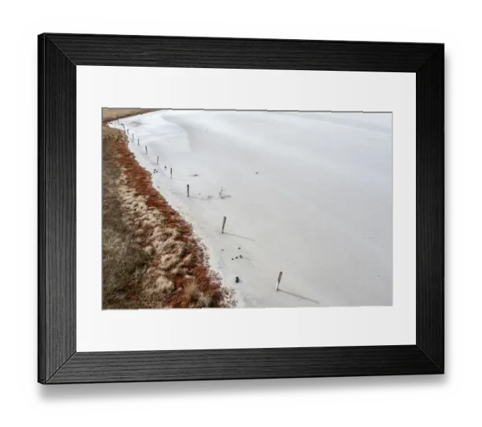 Framed Print : Aerial view point over white and grey colored salt lake with red rock colors Framed Print : Aerial view point over white and grey colored salt lake with red rock colors