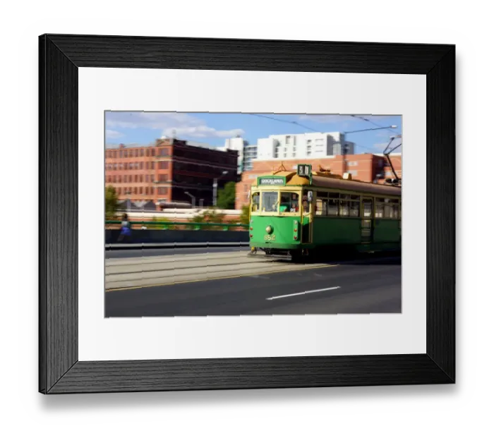Framed Print : Electric tram traveling at speed Framed Print : Electric tram traveling at speed