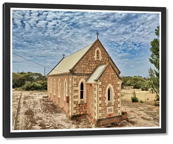 Aerial view of an old remote stone church in rural South Australia - Calca