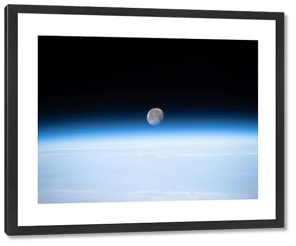 Gibbous Moon just above Earths horizon