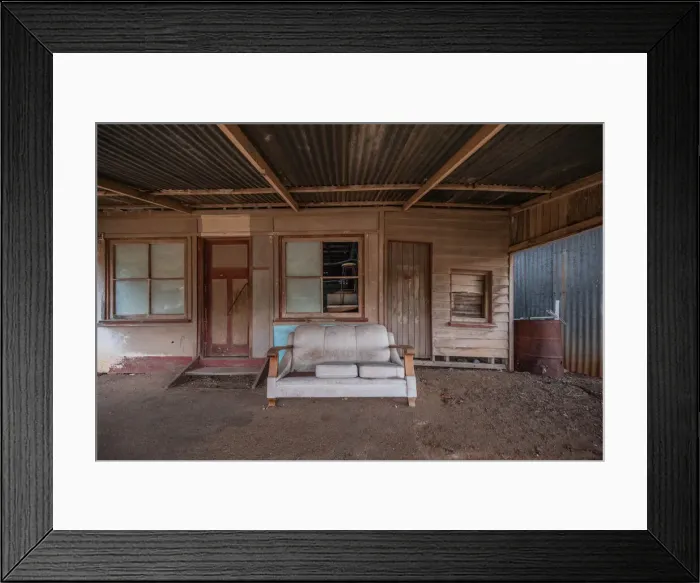 Framed Print : An old shop front in an abandoned town