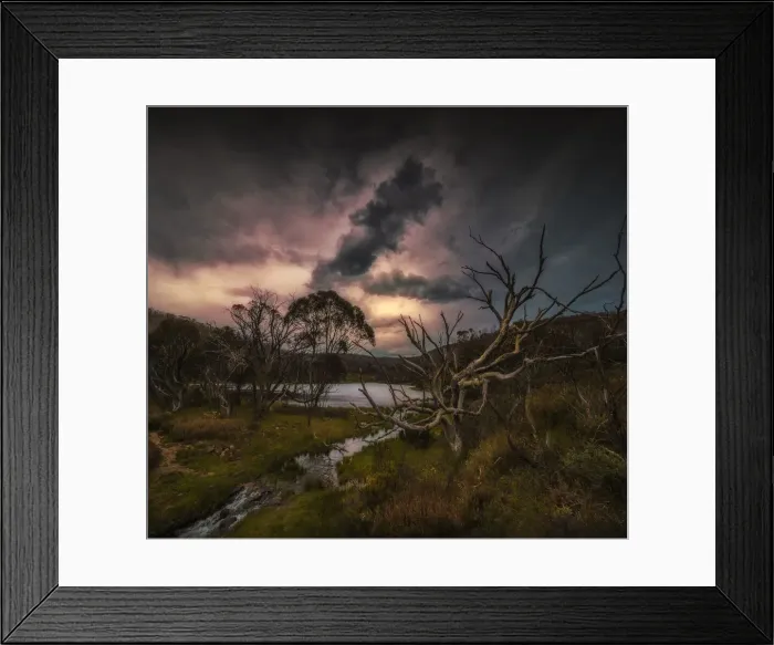 Framed Print : Dramatic storm clouds pass over the landscape in the Kosciuszko National Park Framed Print : Dramatic storm clouds pass over the landscape in the Kosciuszko National Park