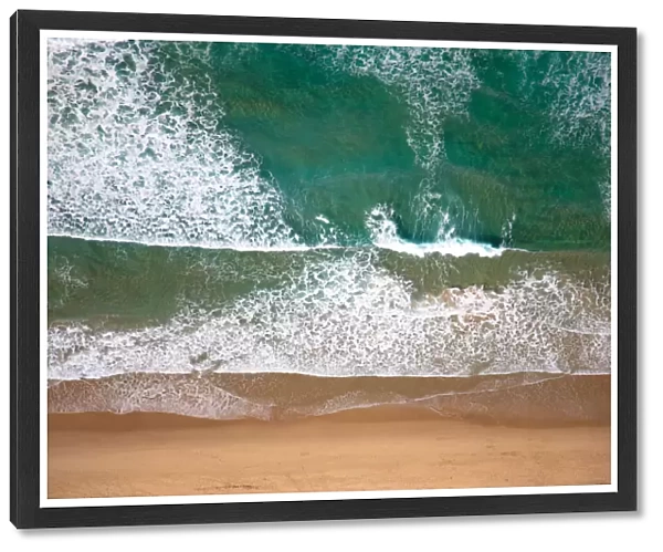 Aerial view of a beach in Mooloolaba, Sunshine Coast with turquoise coloured water