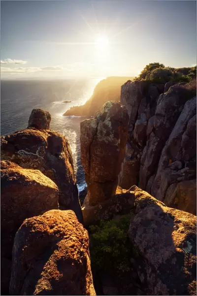 Sunlight lighting up the Tasman Peninsula from Cape Raoul, Tasman National Park, Tasmania