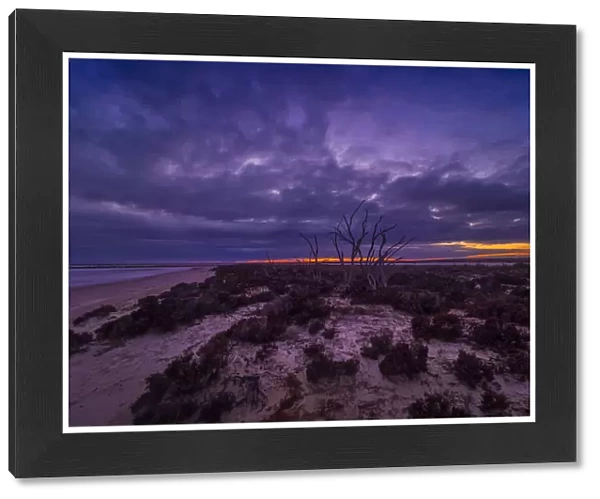 Stormy dawn light approaching Lake Tyrrell, which is situated near the town of SeaLake in the Wimmera District of Victoria, Australia