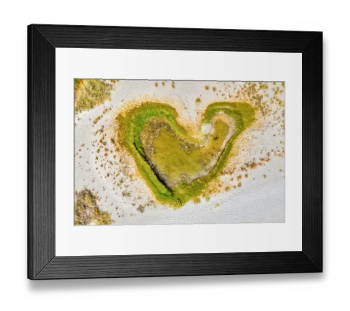 Framed Print : Green heart shaped puddle on a white sandy beach beach