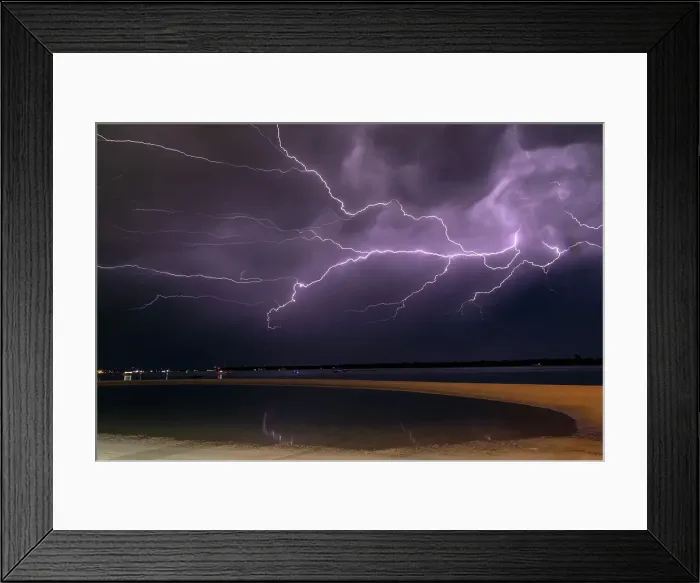 Framed Print : Flashes of bright lightning strikes across the water with stormy clouds and sky Framed Print : Flashes of bright lightning strikes across the water with stormy clouds and sky