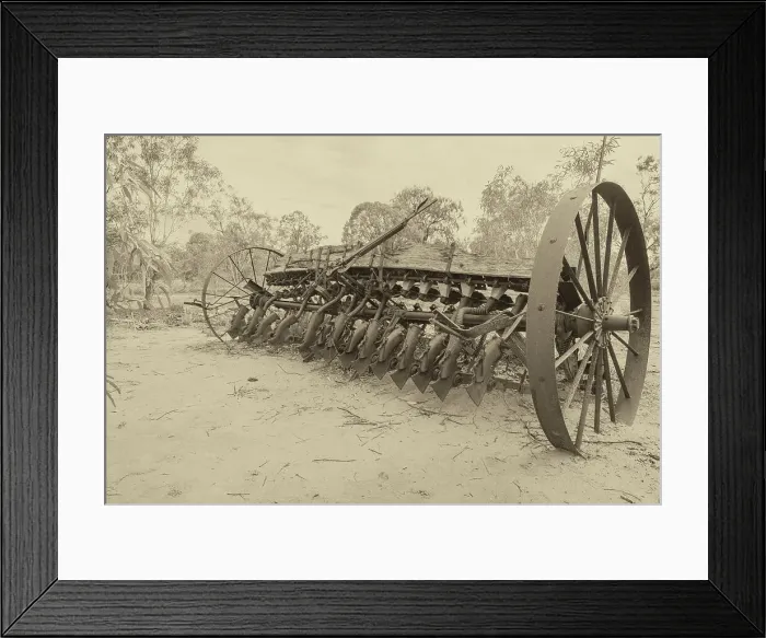 Framed Print : Old farm equipment