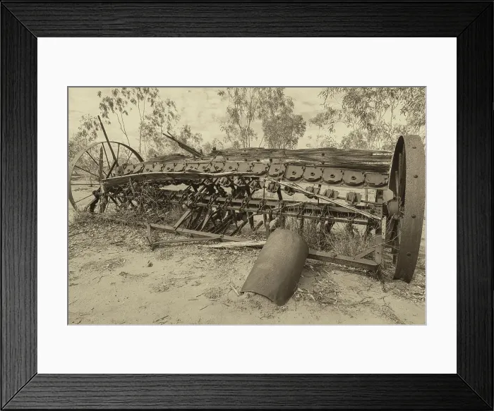 Framed Print : Old farm equipment