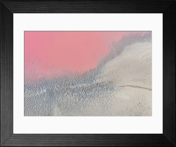Framed Print : Drone view point of the pink shades of color, patterns and textures over Pink Lake waters with dark salty sandy soil
