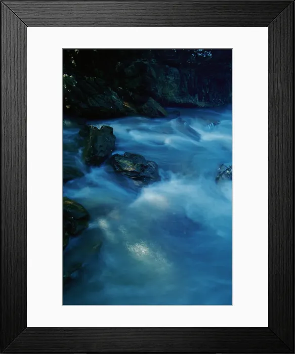 Framed Print : New South Wales, Australia. Blue pastel water breaks over rocks at Bittangabee Bay Framed Print : New South Wales, Australia. Blue pastel water breaks over rocks at Bittangabee Bay