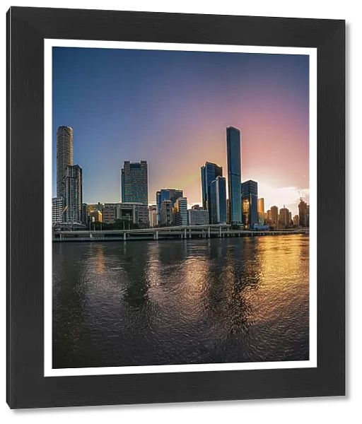 Scene of Brisbane Cityscape and Victoria Bridge over Brisbane River at Sunrise time in central business district or call CBD, Brisbane