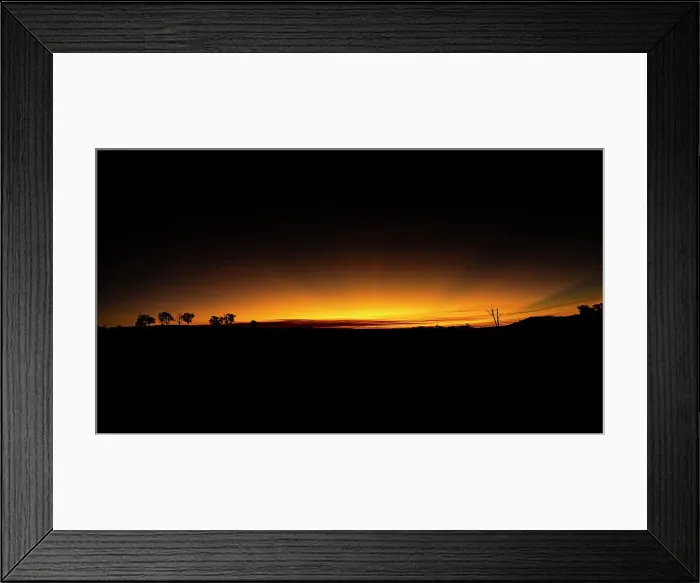 Framed Print : Orange sunset over the horizon
