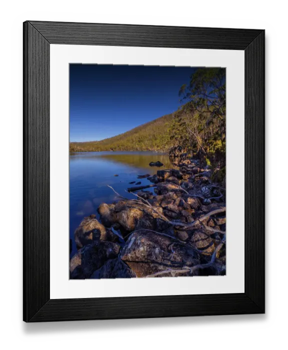 Framed Print : Pirates bay reflections of tress at the shoreline, southern Tasmania