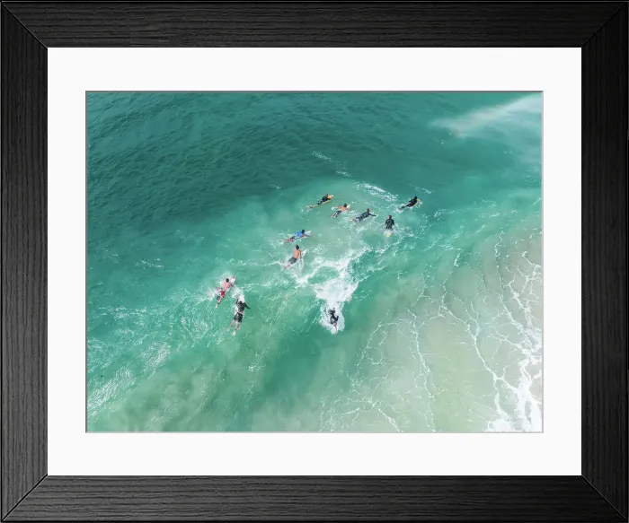 Framed Print : Surfers on the Coral Sea shot from a high angle perspective, Gold Coast, Queensland, Australia