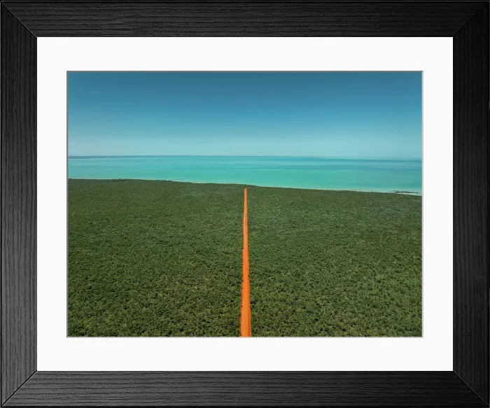 Framed Print : Orange coloured dirt road heading towards the Indian Ocean photographed from an aerial perspective on a sunny day, Western Australia, Australia Framed Print : Orange coloured dirt road heading towards the Indian Ocean photographed from an aerial perspective on a sunny day, Western Australia, Australia