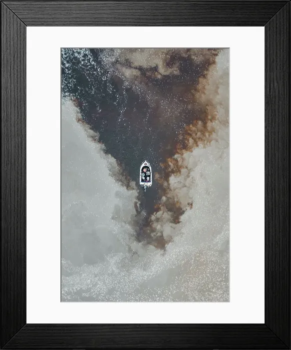 Framed Print : Drone photo looking down on a speedboat between clouds of sediment flowing down the Mary River, Northern Territory, Australia Framed Print : Drone photo looking down on a speedboat between clouds of sediment flowing down the Mary River, Northern Territory, Australia