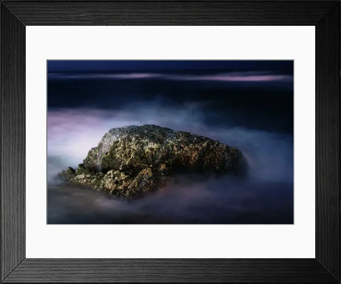Framed Print : A Night View of a Rock in the Middle of the Sea Waves in a Long Exposure View Framed Print : A Night View of a Rock in the Middle of the Sea Waves in a Long Exposure View