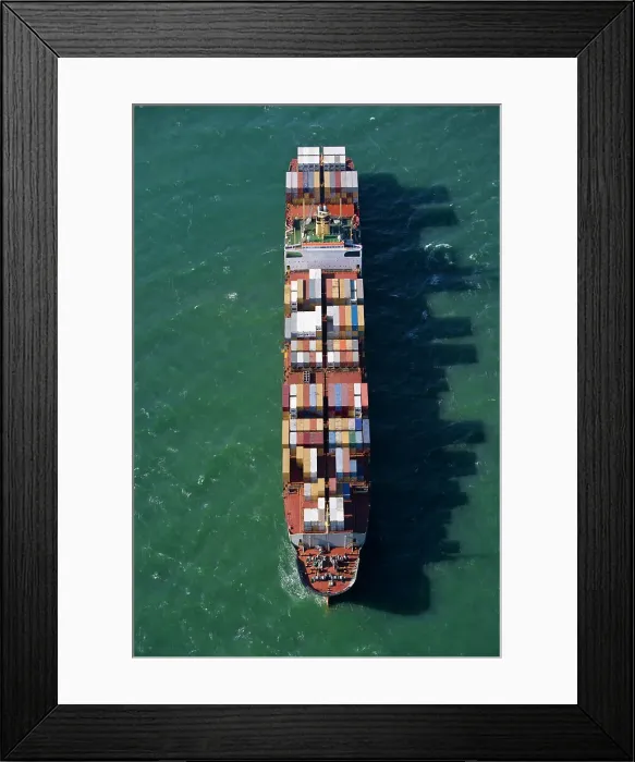 Framed Print : Container ship at sea, aerial view
