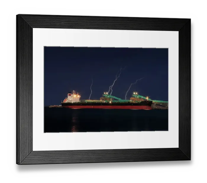 Framed Print : Stormy dramatic sky with lightning breaking over a ship at Port Lincoln. Eyre Peninsula. South Australia Framed Print : Stormy dramatic sky with lightning breaking over a ship at Port Lincoln. Eyre Peninsula. South Australia