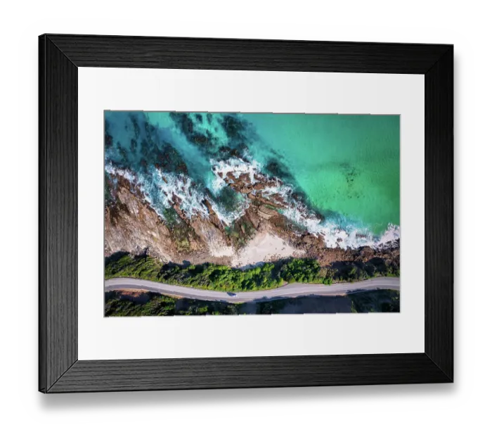 Framed Print : Aerial car driving along coastal road Framed Print : Aerial car driving along coastal road