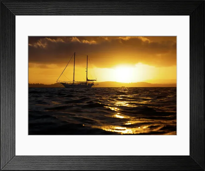 Framed Print : sailing boat on lake at sunset