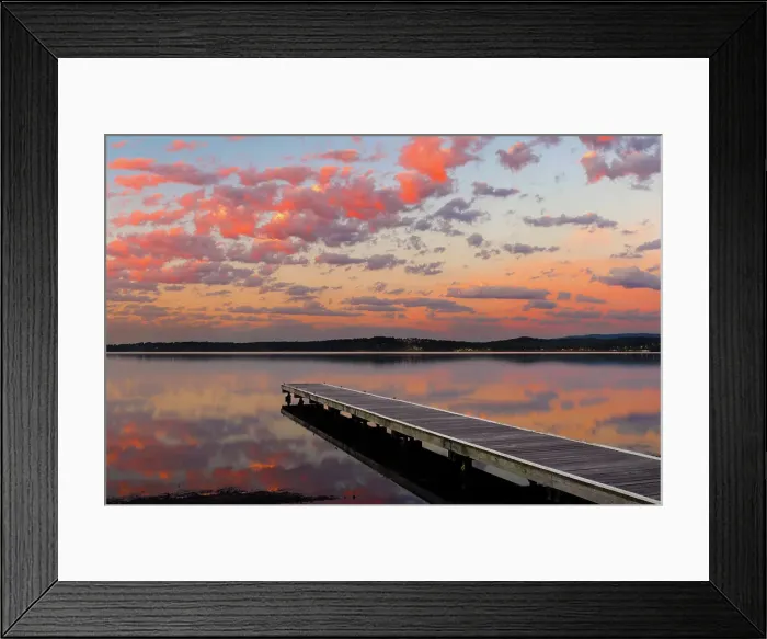 Framed Print : sunrise with clouds over a jetty on the lake Framed Print : sunrise with clouds over a jetty on the lake