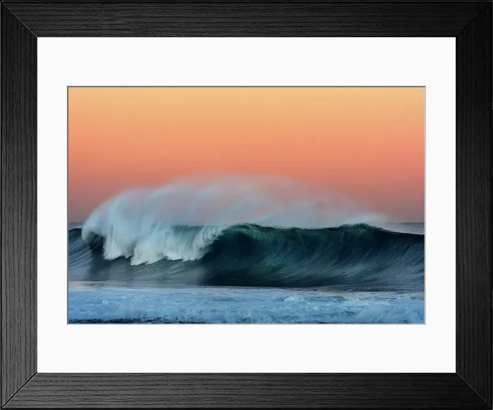 Framed Print : breaking wave with sunset colours in the sky Framed Print : breaking wave with sunset colours in the sky
