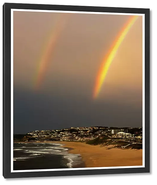 double rainbow over beach after a storm passed through