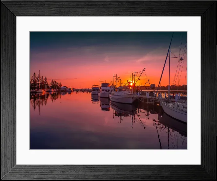 Framed Print : A summer dawn light castes a glow over the boats and harbour area at Lakes Entrance, East Gippsland Framed Print : A summer dawn light castes a glow over the boats and harbour area at Lakes Entrance, East Gippsland