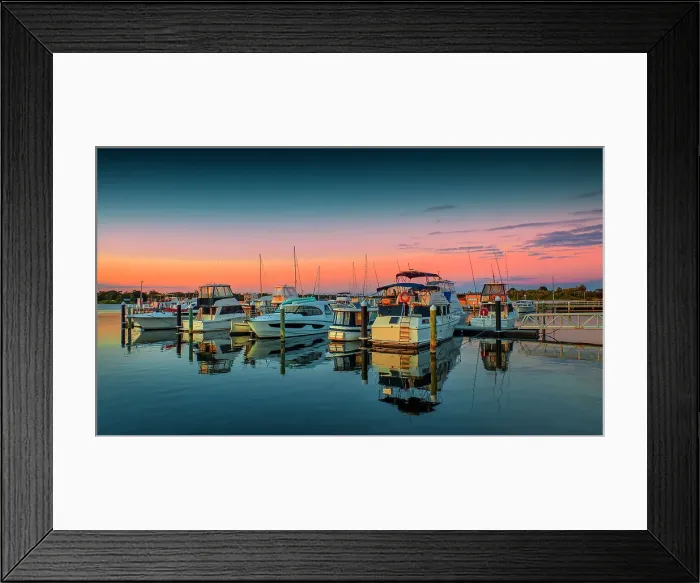 Framed Print : A summer dawn light castes a glow over the boats and harbour area at Lakes Entrance, East Gippsland