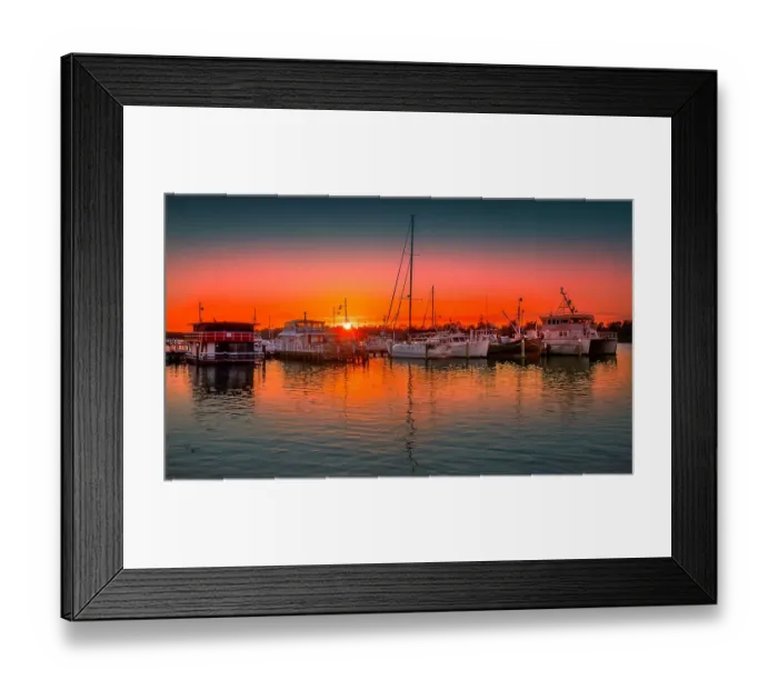Framed Print : A summer dawn light castes a glow over the boats and harbour area at Lakes Entrance, East Gippsland