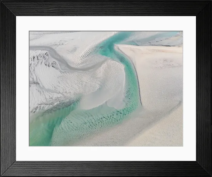 Framed Print : Drone shot showing a water channel flowing in Willie Creek estuary at low tide, Western Australia, Australia Framed Print : Drone shot showing a water channel flowing in Willie Creek estuary at low tide, Western Australia, Australia